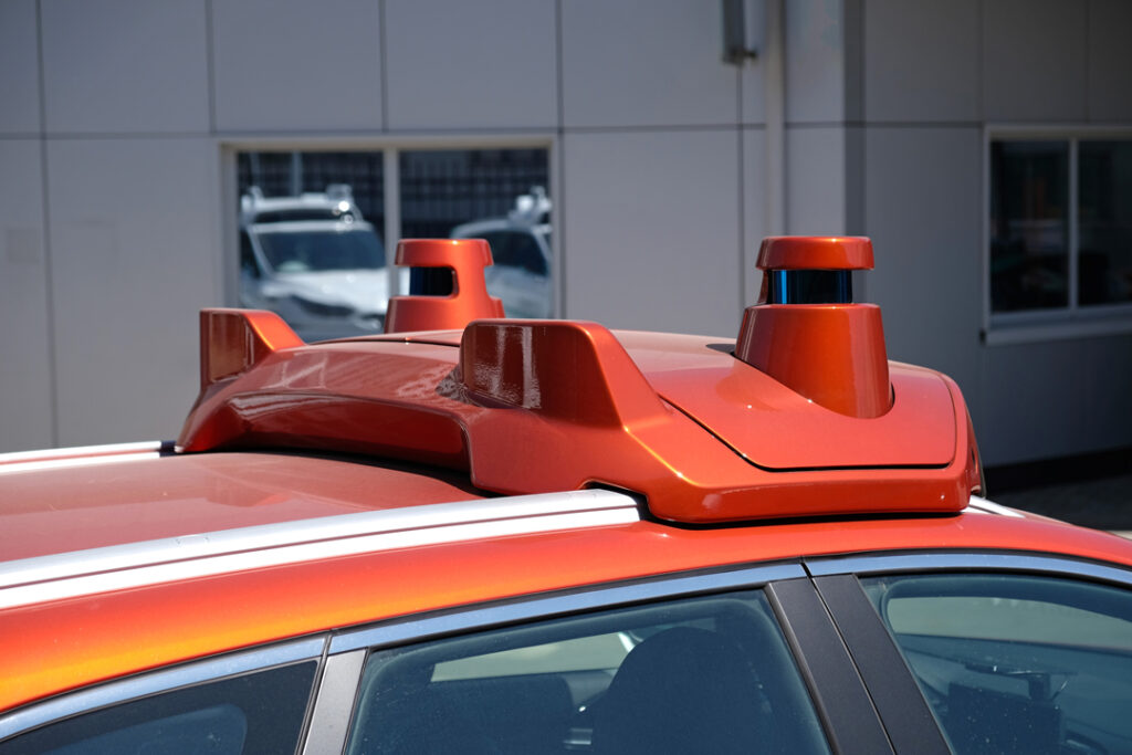 Figure 2: LiDAR sensors and camera on roof of a self-driving car.